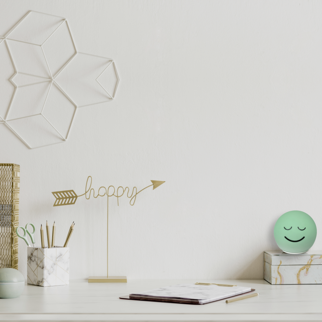 Calm mint Breathing Ball with a smiling face on a desk, a guided deep-breathing aid for HRV relaxation
