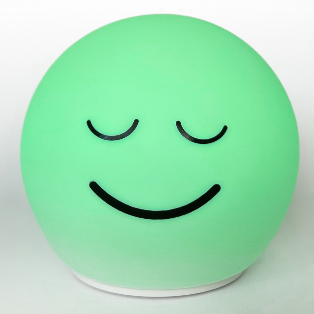 Breathing Ball glowing soft green with a calm smiling face for guided breathing meditation and HRV relaxation